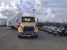 Transport of a helicopter from Curacao to Italy for repair and vice versa, 2012